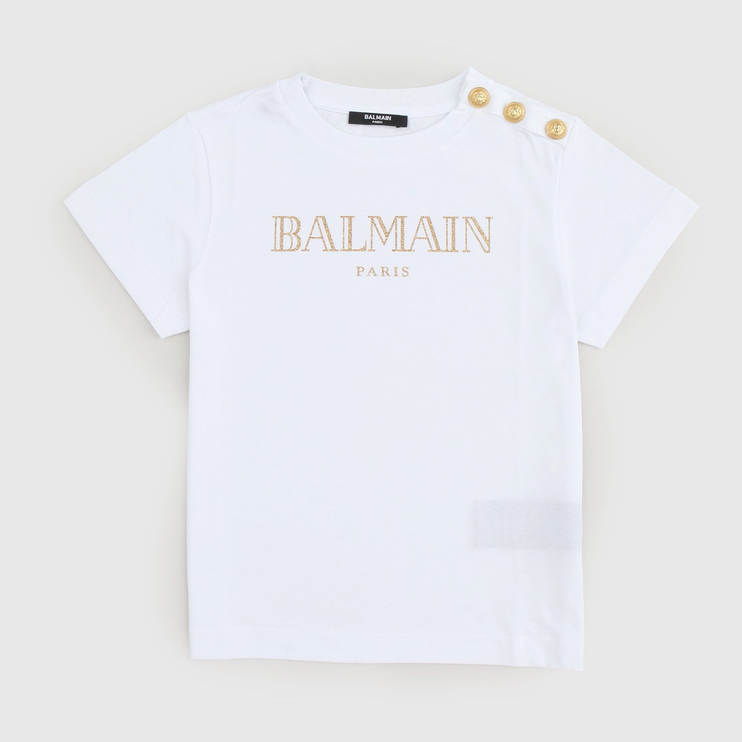 T-shirt con logo d’oro e bottoni dorati - annameglio.com abbigliamento moda