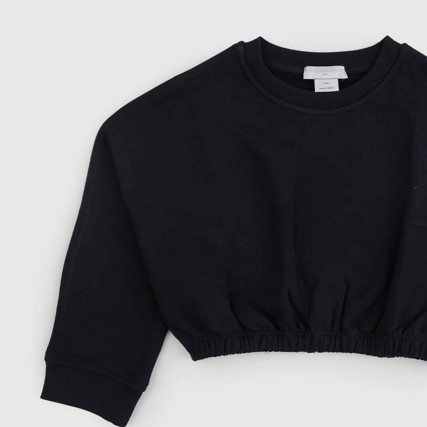 Felpa cropped nera lettering multicolore - annameglio.com abbigliamento moda