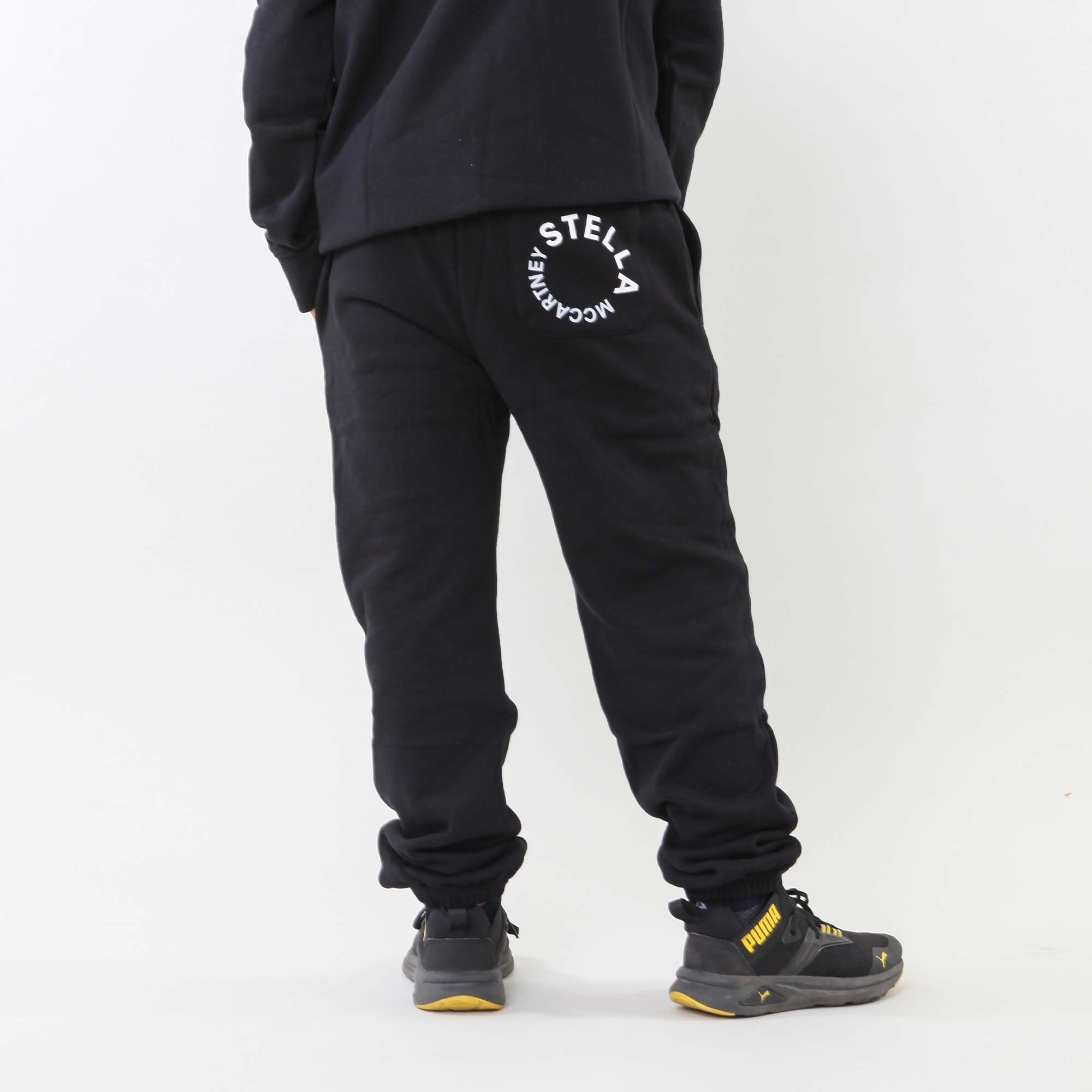 Pantalone nero con logo circolare - annameglio.com abbigliamento moda