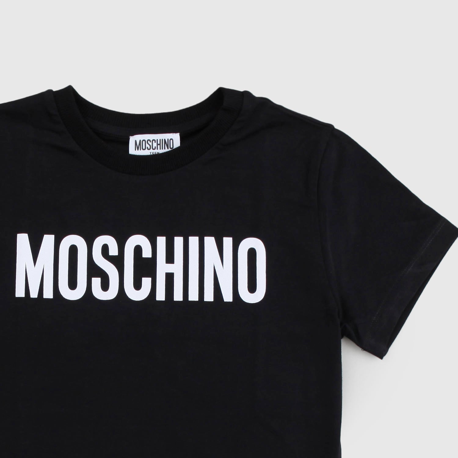 T-shirt nera con logo bianco in contrasto - annameglio.com abbigliamento moda