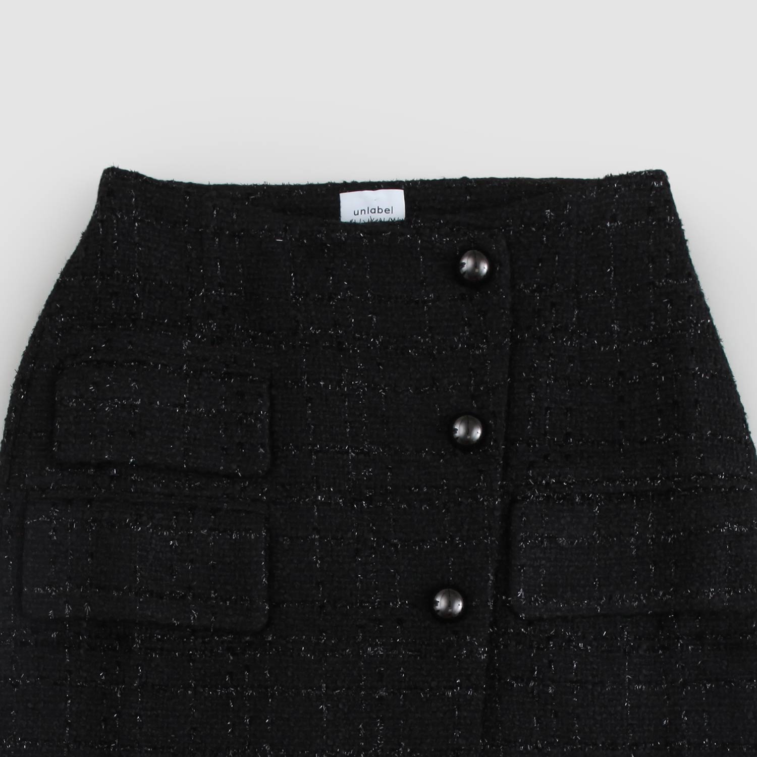 Gonna nera a portafoglio UNLABEL - annameglio.com abbigliamento moda