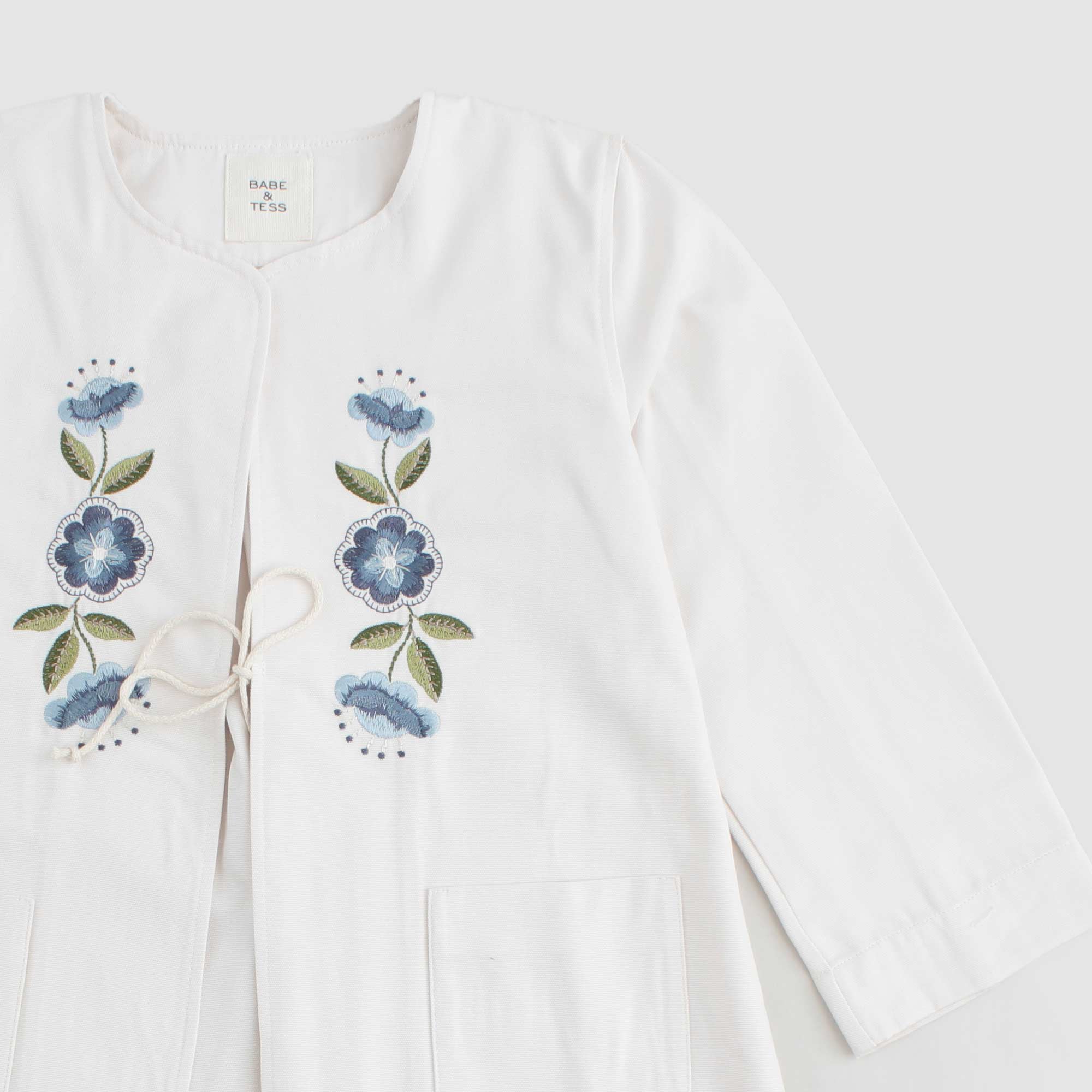 Spolverino Bianco Firmato BABE AND TESS - annameglio.com abbigliamento moda