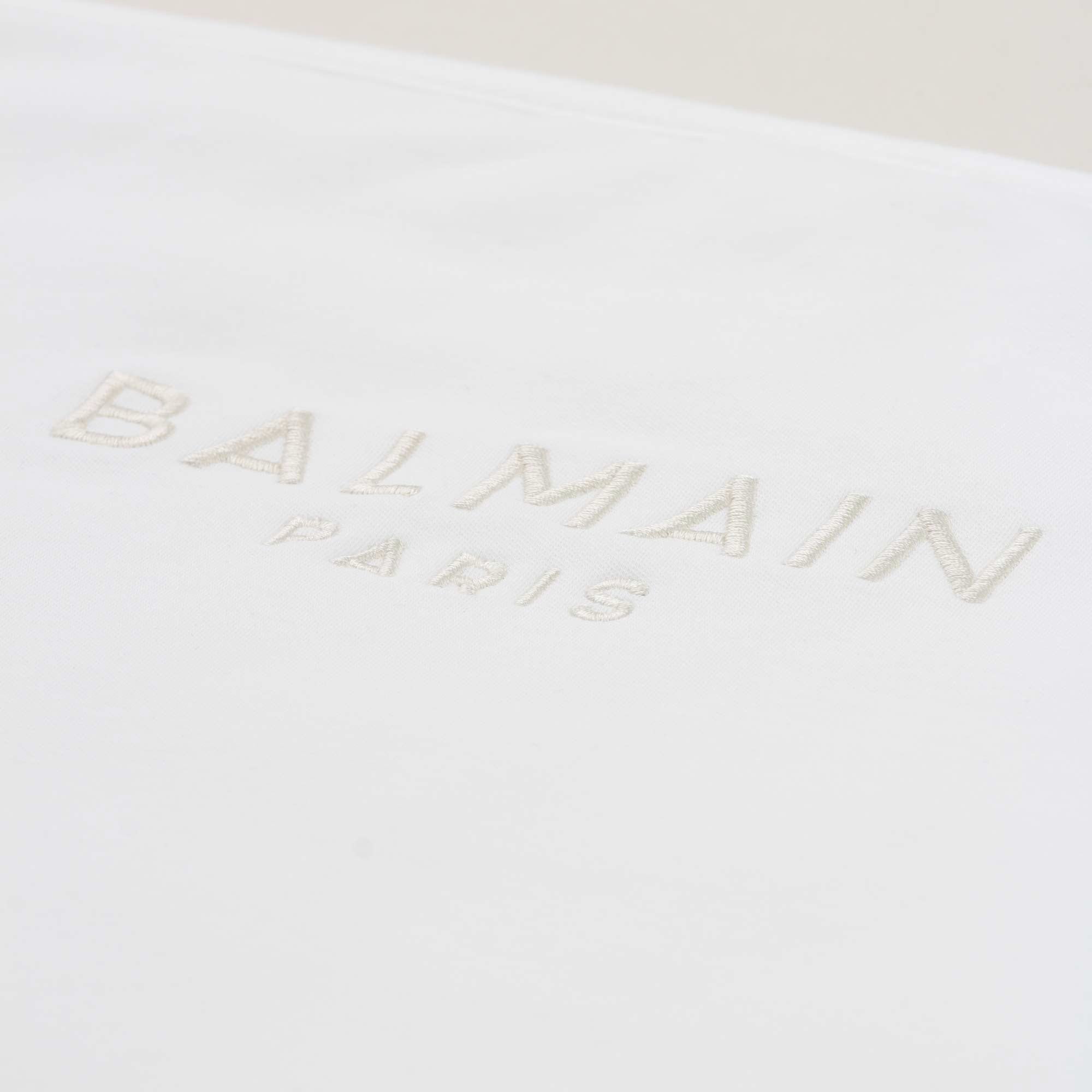 Copertina Bianco E Oro Firmata BALMAIN - annameglio.com abbigliamento moda