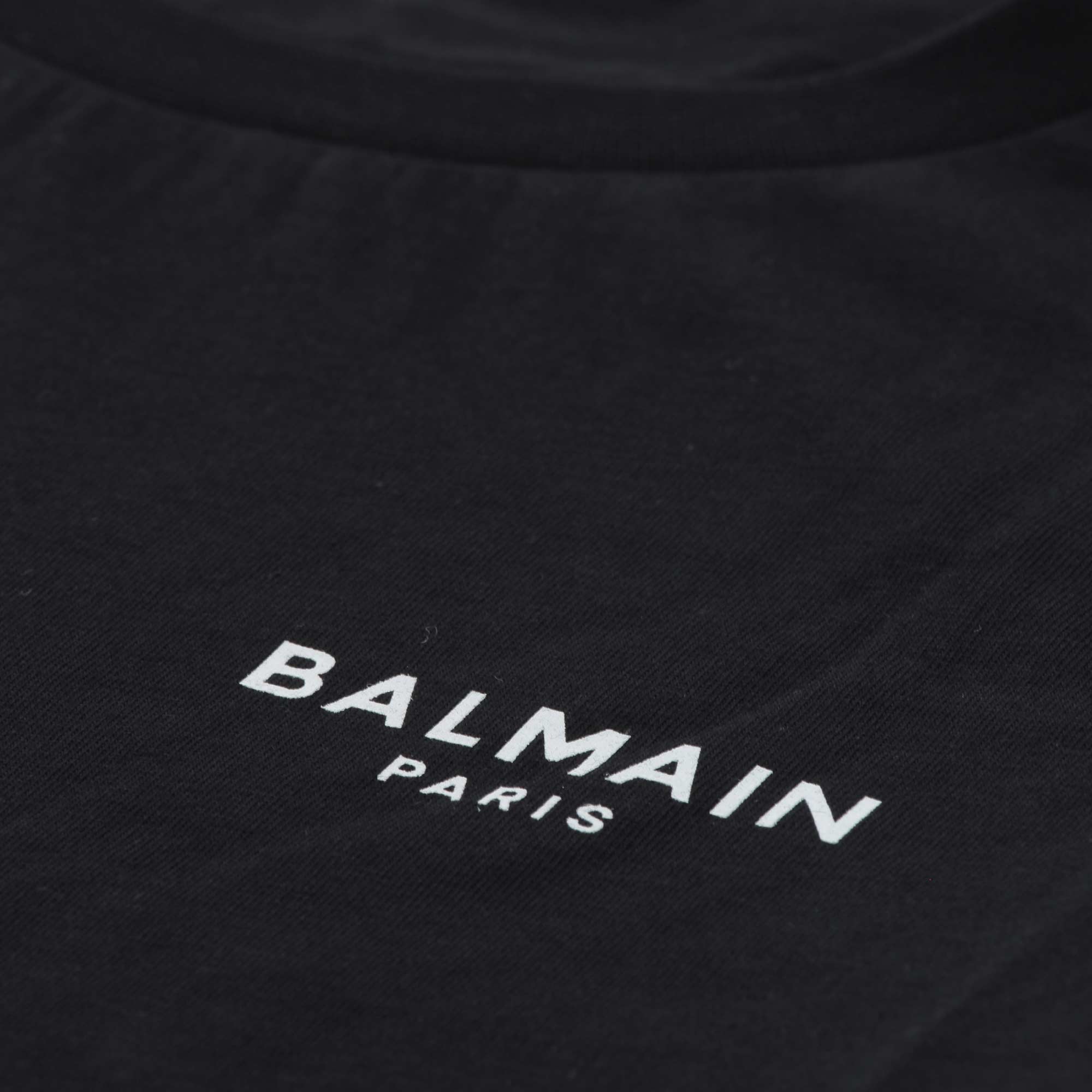 T-shirt Nera Con Logo Bianco Firmata BALMAIN - annameglio.com abbigliamento moda