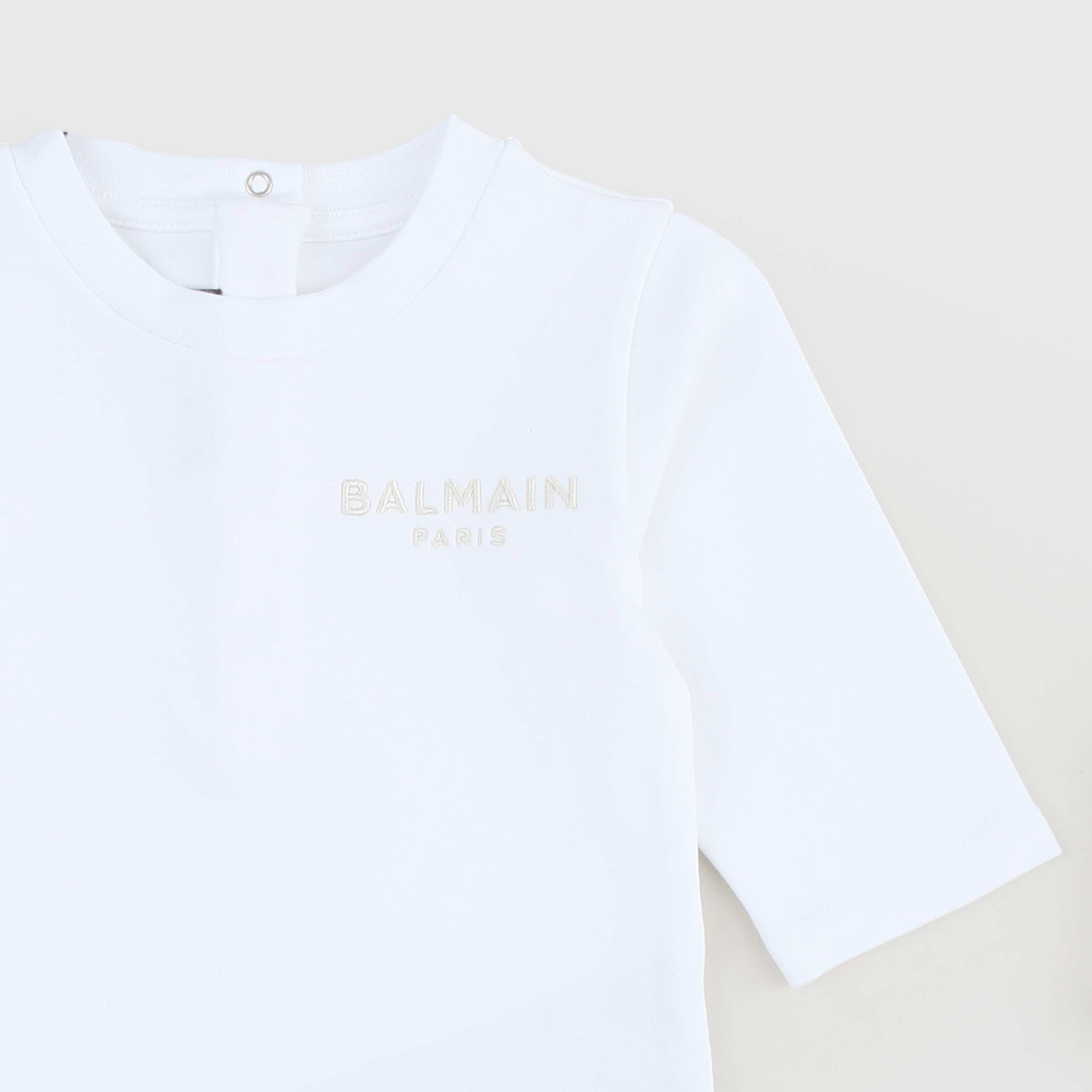 Tutina Bianca Con Cappellino Firmata BALMAIN - annameglio.com abbigliamento moda