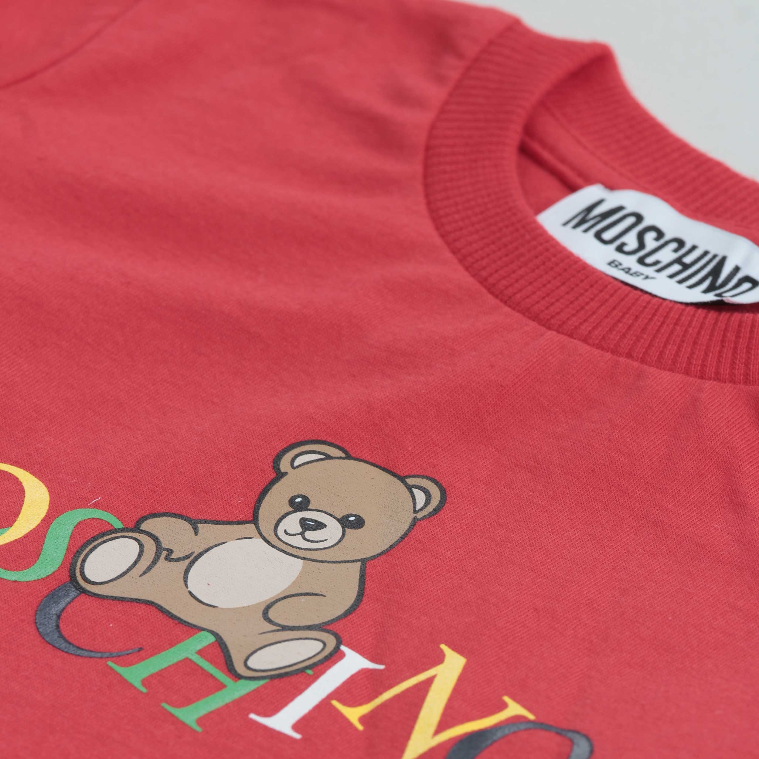 T-shirt Rossa Manica Lunga Firmata MOSCHINO - annameglio.com abbigliamento moda