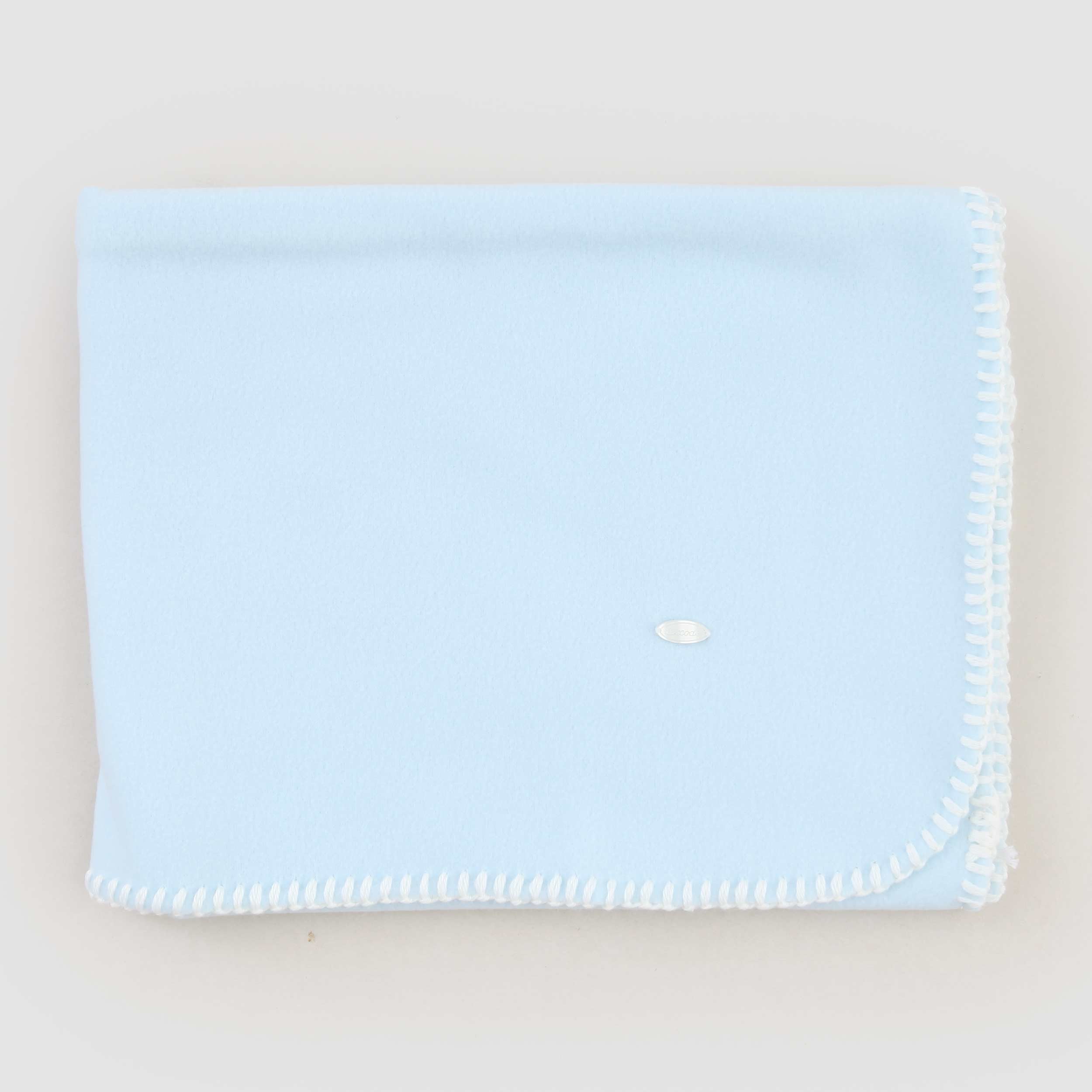 Copertina Celeste Bordata Firmata COCCODE - annameglio.com abbigliamento moda