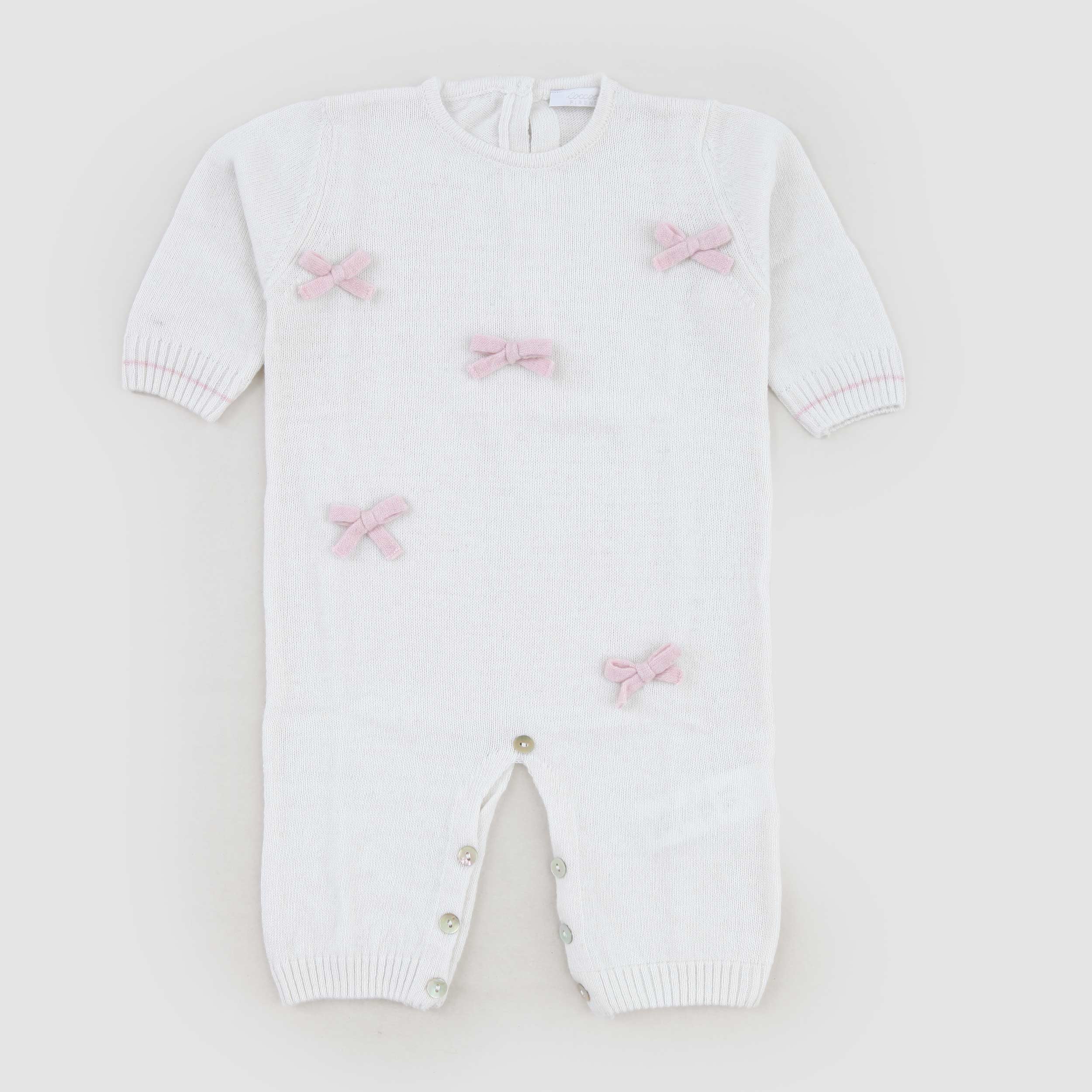 Tutina Latte E Rosa Con Fiocchi Firmata COCCODE - annameglio.com abbigliamento moda