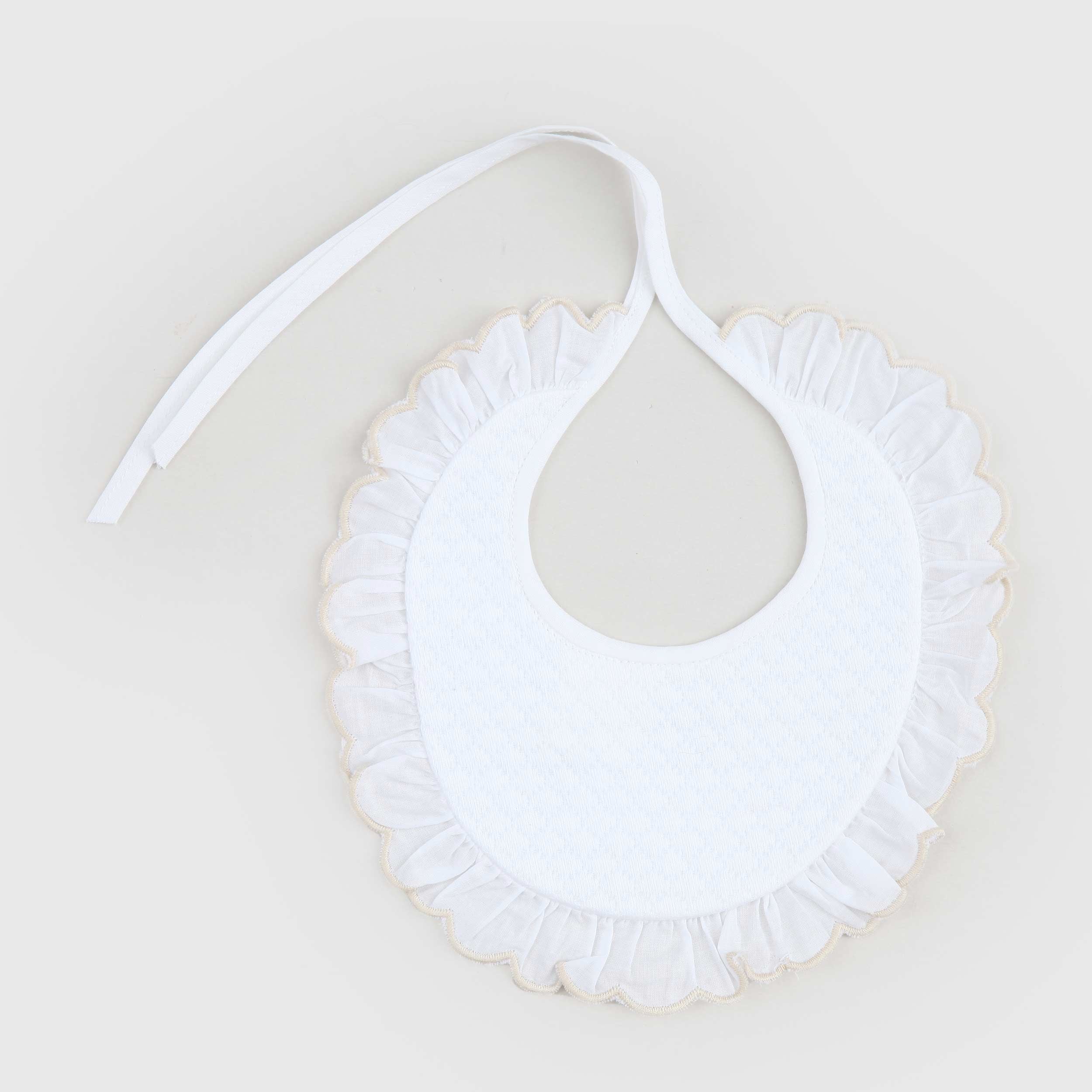 White bib with embroidery signed BARONI