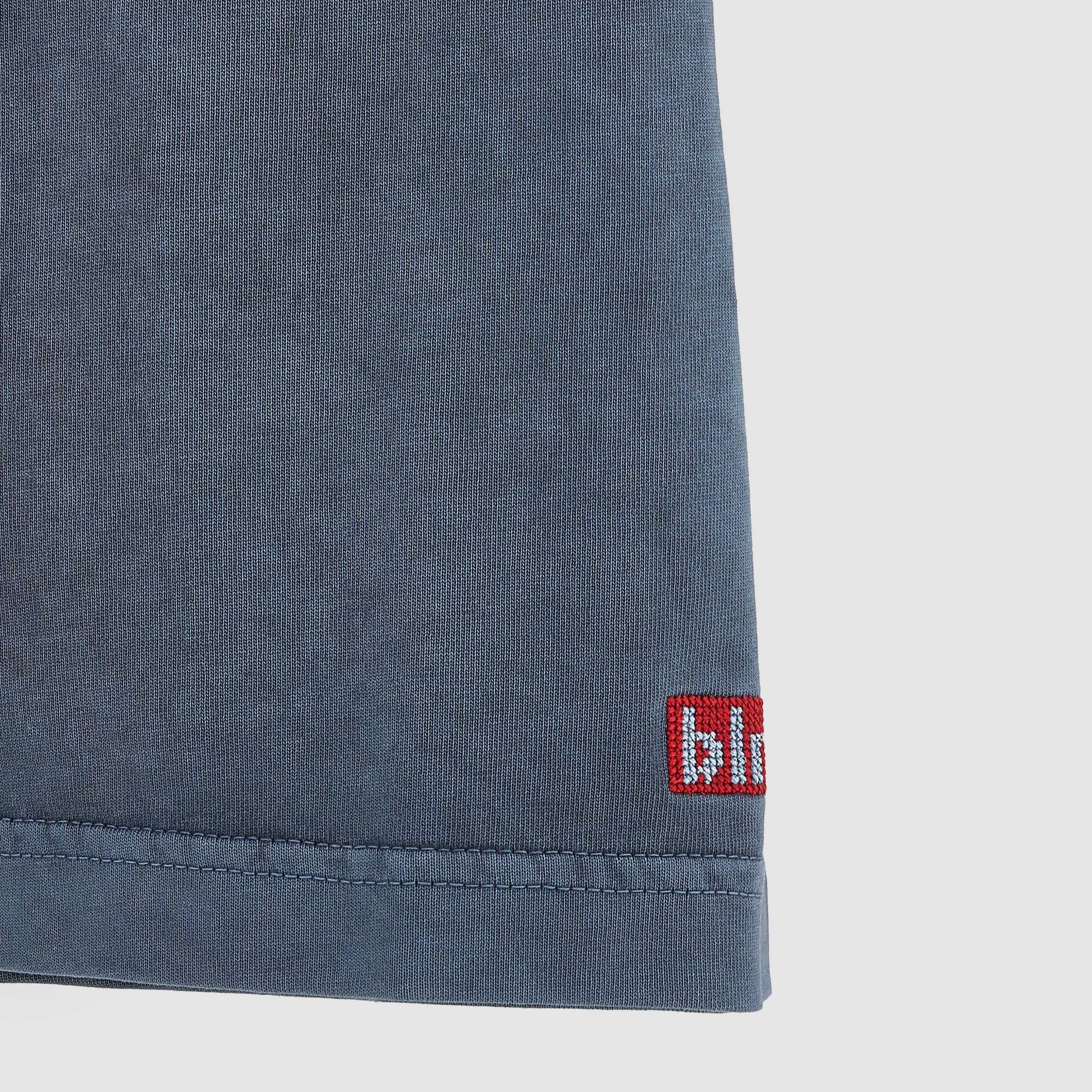 Grey T-shirt with iconic red tag by BELLEROSE