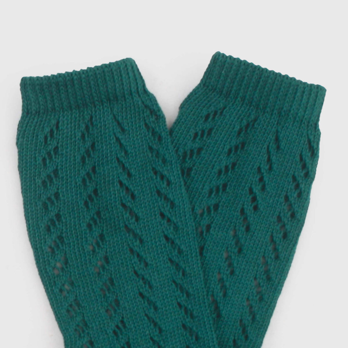 Green Perforated Long Socks for Newborns by COCCODE