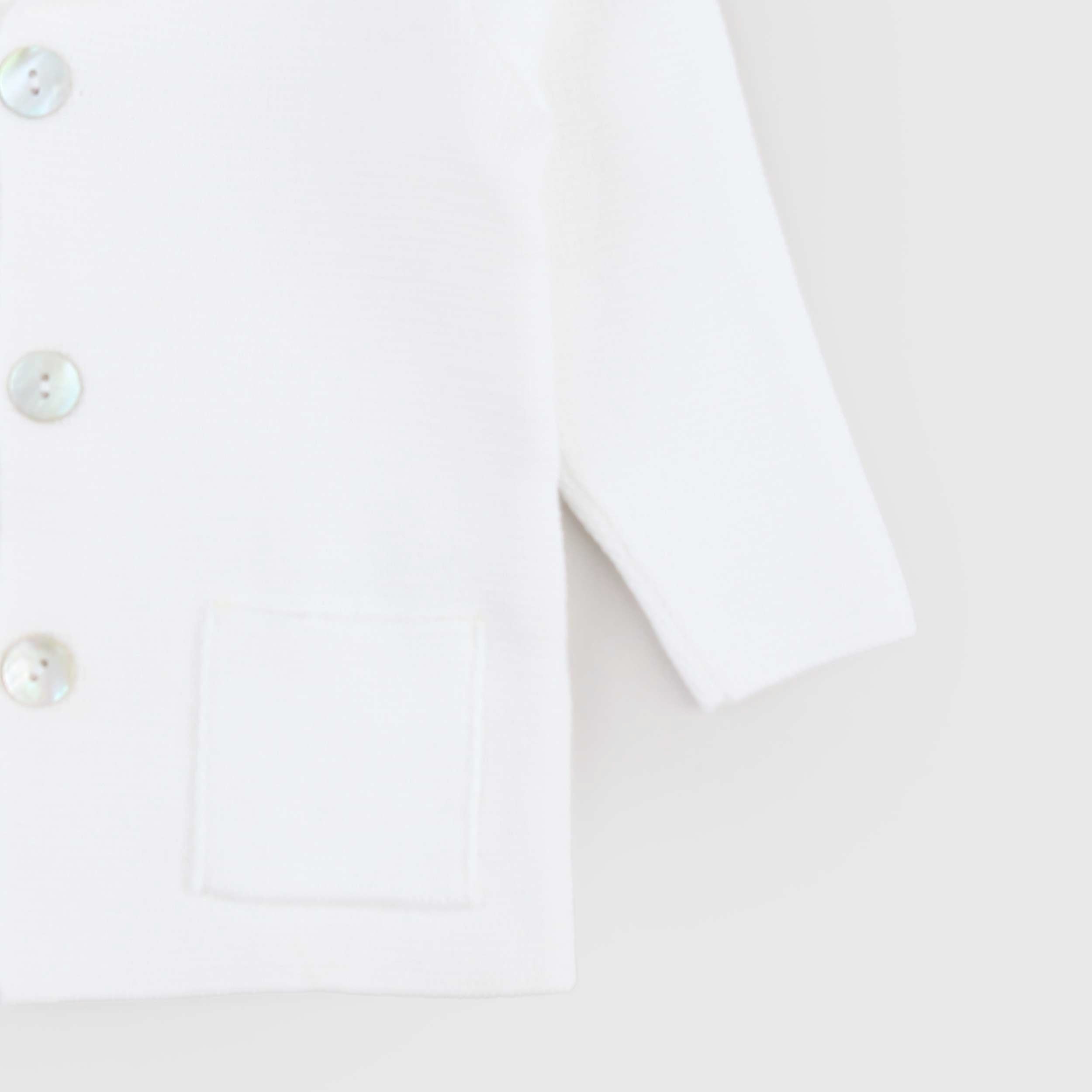 White Cardigan with Mother-of-Pearl Buttons by COCCODE