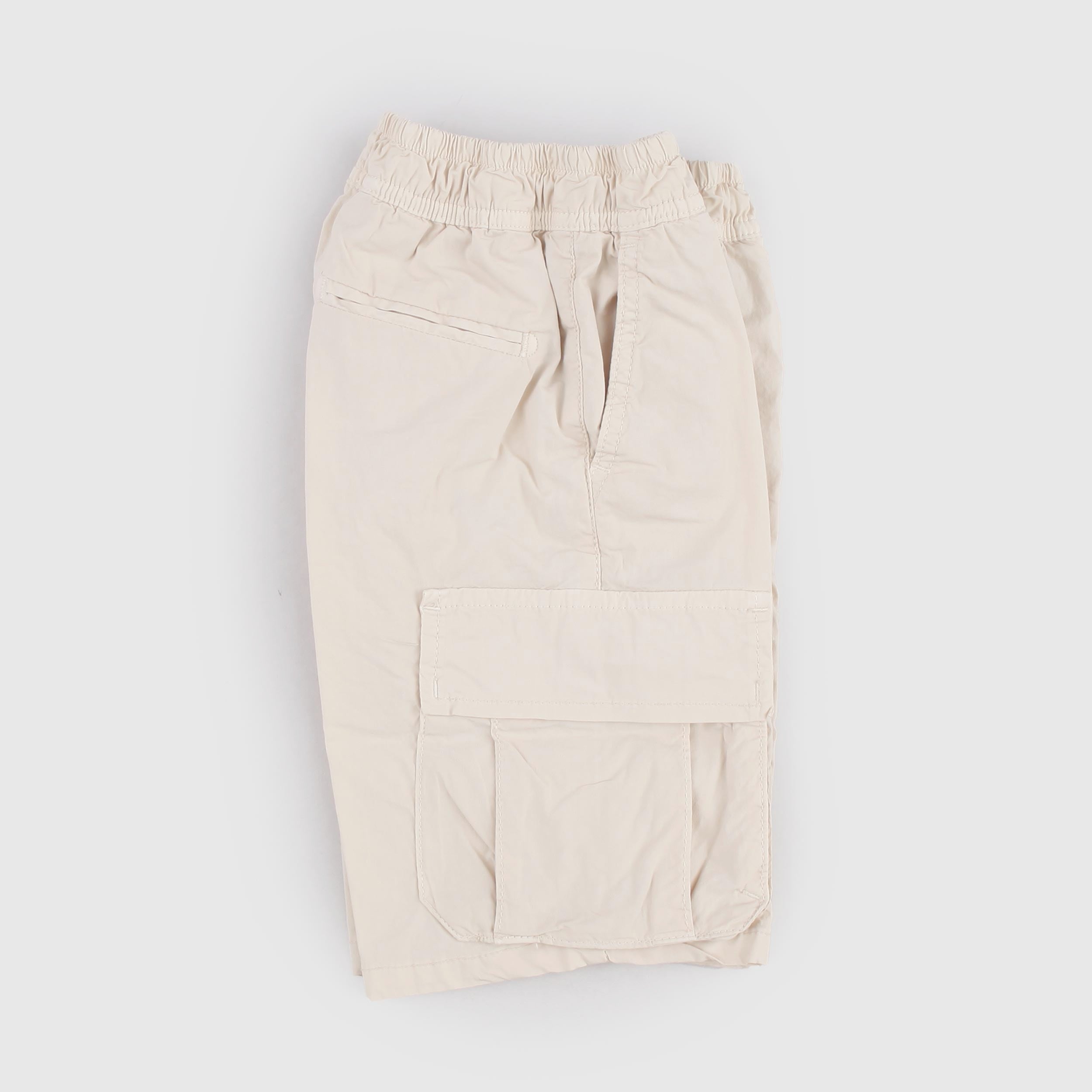 Beige Bermuda Shorts with Oblique Pockets by DUSTY COLOR