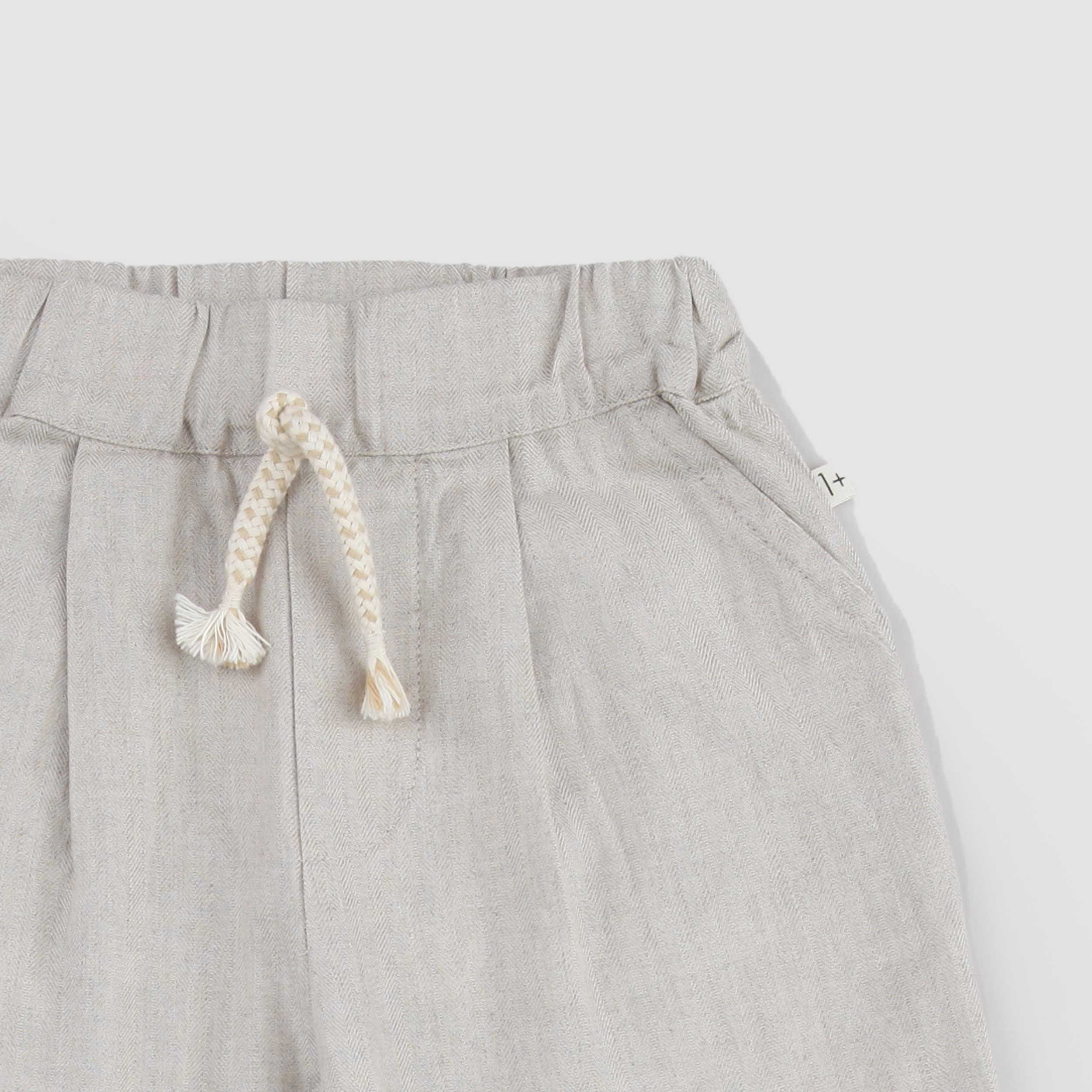 Pantalone Beige con Pinces Firmato ONE MORE IN THE FAMILY