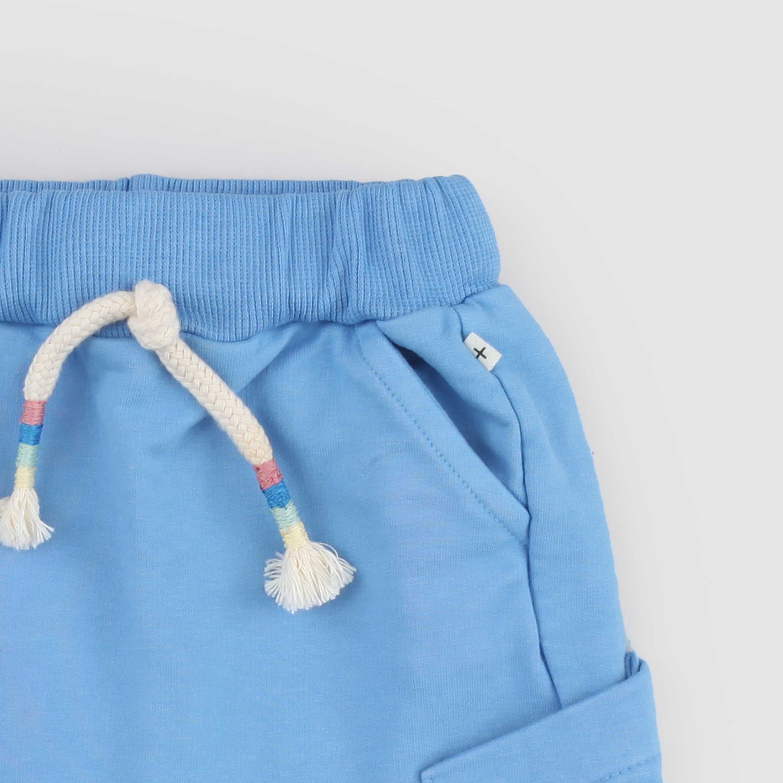 Pantalone Celeste Elasticizzato Firmato ONE MORE IN THE FAMILY