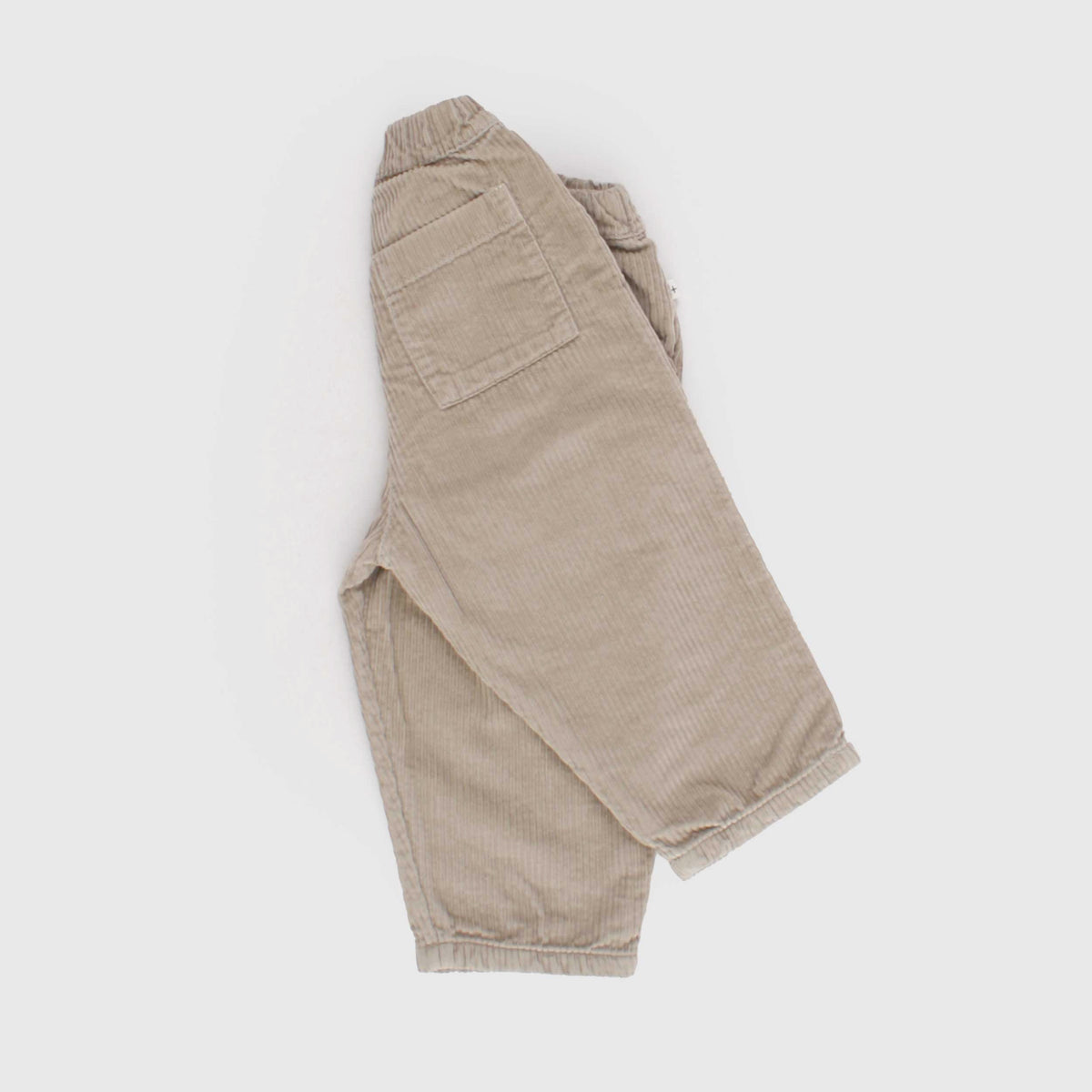 Beige Ribbed Velvet Trousers for Newborn by ONE MORE IN THE FAMILY