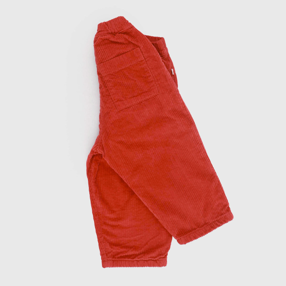 Red Ribbed Velvet Trousers for Newborn by ONE MORE IN THE FAMILY