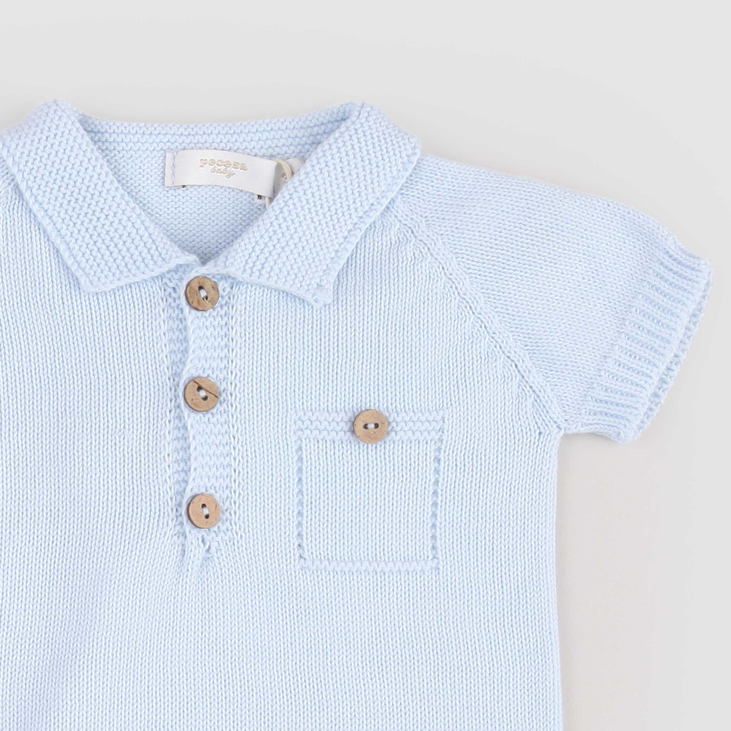 Tutina Celeste con Bottoni in Legno Firmata PECESA