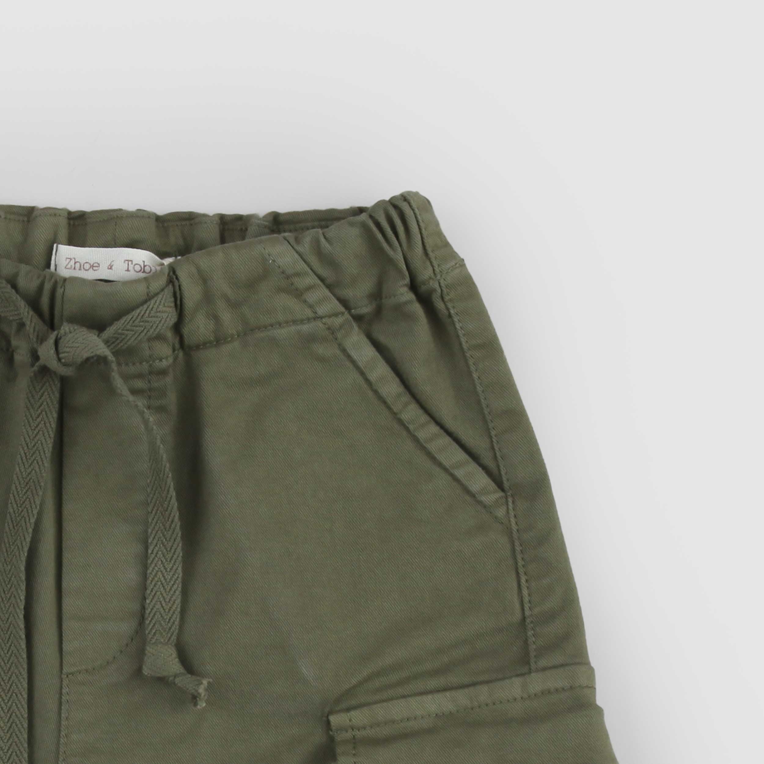 Green Bermuda Shorts with Slanted Pockets by ZHOE AND TOBIAH